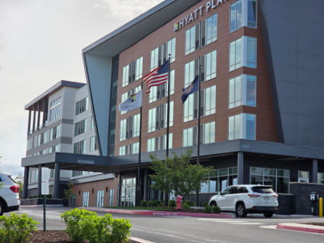 Modern hotel or commercial building exterior with clean windows